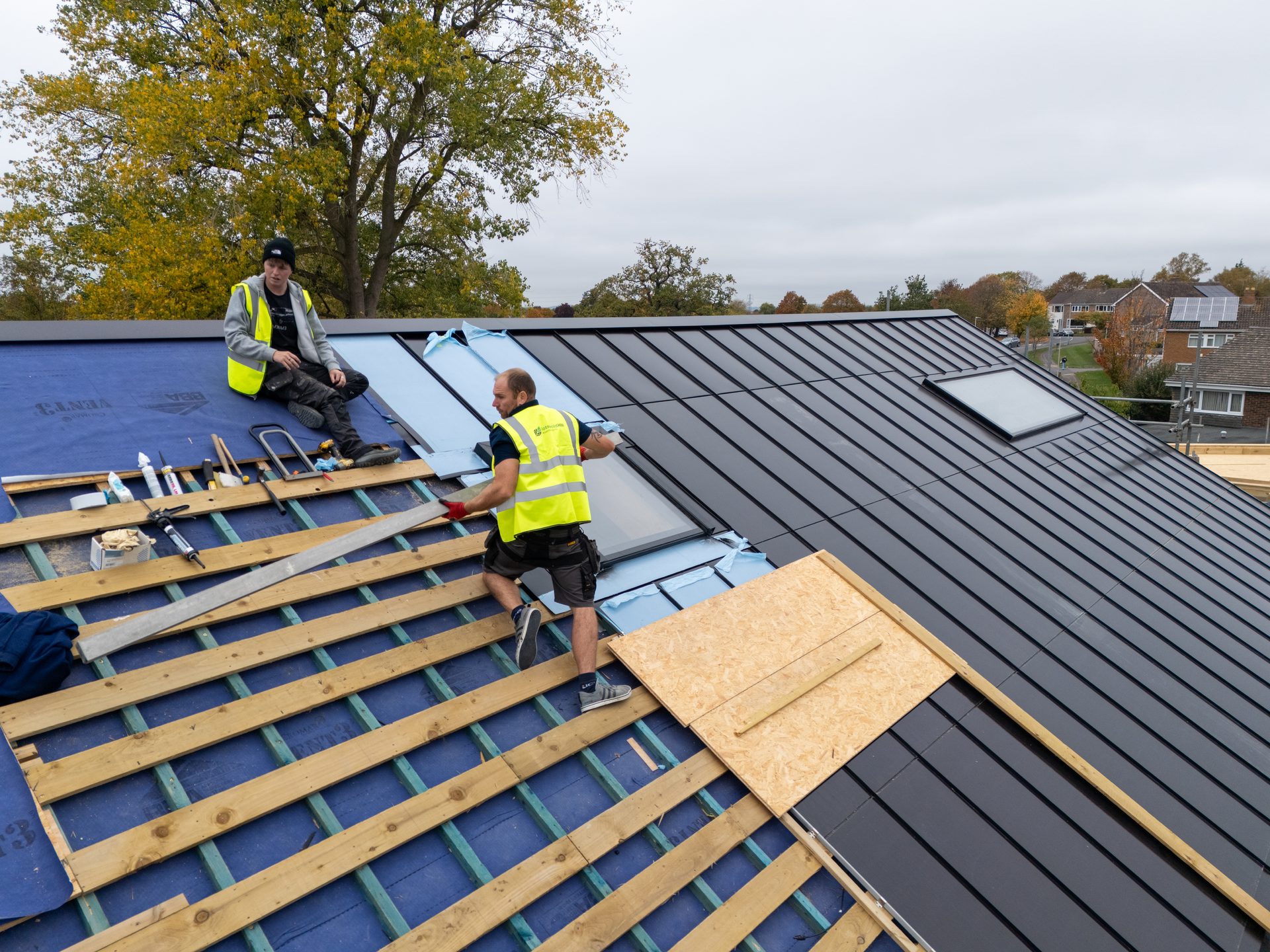 SMRSS engineers working on Roofit.Solar roof